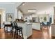 Open kitchen with breakfast bar and adjacent breakfast nook at 1485 Mill Place Dr, Dacula, GA 30019
