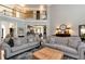 Large living room with fireplace and staircase to second floor at 1485 Mill Place Dr, Dacula, GA 30019
