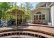 Multi-tiered deck and pergola create an ideal outdoor entertaining space at 1660 Maple Ridge Dr, Loganville, GA 30052