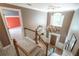 Grand foyer with high ceilings, chandelier, and a view of the front entrance at 1660 Maple Ridge Dr, Loganville, GA 30052