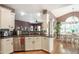 Bright eat-in kitchen with stainless steel appliances, granite countertops, and natural light at 1660 Maple Ridge Dr, Loganville, GA 30052