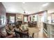 Comfortable living room with hardwood floors, fireplace, and view into the dining area at 1660 Maple Ridge Dr, Loganville, GA 30052
