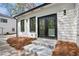 Back of house shows steps and black frame windows and doors at 1882 Francis Nw Ave, Atlanta, GA 30318