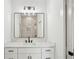 Bathroom features modern vanity, framed mirror, and overhead light fixture at 1882 Francis Nw Ave, Atlanta, GA 30318