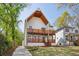 Stunning two-story modern farmhouse with wood balconies and beautiful curb appeal at 1882 Francis Nw Ave, Atlanta, GA 30318
