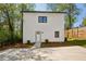 Charming two-story home with a well-manicured lawn, new landscaping, and a private driveway at 1882 Francis Nw Ave, Atlanta, GA 30318