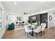 Open concept living and dining area featuring modern decor and ample natural light at 1882 Francis Nw Ave, Atlanta, GA 30318