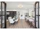 Bright living room features sleek fireplace, dining area, and open kitchen layout at 1882 Francis Nw Ave, Atlanta, GA 30318