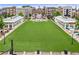 This fantastic aerial view shows the large manicured green space and surrounding buildings at 284 Hook St, Alpharetta, GA 30009
