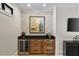 Chic bar area featuring a wine cooler and stylish decor at 284 Hook St, Alpharetta, GA 30009