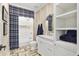 Stylish bathroom featuring tiled floors, shower and vanity with storage at 284 Hook St, Alpharetta, GA 30009