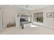 Bright bedroom featuring a bunk bed and large window providing plenty of natural light at 284 Hook St, Alpharetta, GA 30009