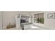 Cozy bedroom featuring a charming bunk bed and ample natural light from the window at 284 Hook St, Alpharetta, GA 30009