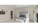Bright bedroom featuring a bunk bed, ceiling fan, and view of the ensuite bath at 284 Hook St, Alpharetta, GA 30009