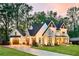 Stunning home exterior featuring a well-manicured lawn, brick and siding accents, and inviting front porch at 284 Hook St, Alpharetta, GA 30009