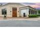 Elegant building featuring a double door entrance and an elegant colonnade at 284 Hook St, Alpharetta, GA 30009