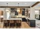 Charming kitchen with stainless steel appliances, granite countertops, and wooden beam at 284 Hook St, Alpharetta, GA 30009