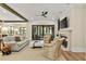 Inviting living room with fireplace, comfortable seating, and view to outside patio at 284 Hook St, Alpharetta, GA 30009