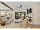 Cozy living room boasts a fireplace, ceiling fan, comfortable seating, and sliding glass doors at 284 Hook St, Alpharetta, GA 30009