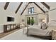 Stunning main bedroom with vaulted ceilings, wood beams, neutral decor, and an abundance of natural light at 284 Hook St, Alpharetta, GA 30009