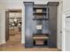 Well-organized mudroom with custom cabinetry, storage solutions, and a seating area for added convenience at 284 Hook St, Alpharetta, GA 30009