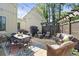 Charming patio with outdoor seating, a dining table, and a pergola, perfect for relaxation and entertaining at 284 Hook St, Alpharetta, GA 30009