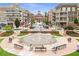 This is a lovely outdoor plaza with a beautiful fountain and seating where visitors can relax at 284 Hook St, Alpharetta, GA 30009