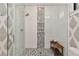 Beautiful glass shower featuring mosaic tile accent and bench seating at 284 Hook St, Alpharetta, GA 30009