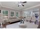Open-concept living room and kitchen featuring hardwood floors, and neutral color palette at 486 Crestmont Ln, Canton, GA 30114