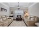 Cozy living room featuring recessed lighting, decorative ceiling, and neutral color palette at 486 Crestmont Ln, Canton, GA 30114