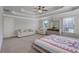 Bright main bedroom with large windows and a seating area, creating a relaxing atmosphere at 486 Crestmont Ln, Canton, GA 30114