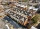 Aerial view of brick townhomes with parking at 700 Piedmont Ne Ave # 4, Atlanta, GA 30308