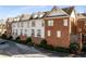 Townhome exteriors with brick accents at 700 Piedmont Ne Ave # 4, Atlanta, GA 30308