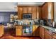 This well-appointed kitchen boasts a stainless steel microwave and gas range, plus adjacent dining area at 700 Piedmont Ne Ave # 4, Atlanta, GA 30308