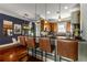 Kitchen with stone countertops and bar seating with a view into the dining and living spaces at 700 Piedmont Ne Ave # 4, Atlanta, GA 30308