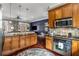 Well-lit kitchen features updated cabinets, stainless appliances, and a view into the adjacent dining area at 700 Piedmont Ne Ave # 4, Atlanta, GA 30308