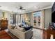 Living area featuring hardwood floors, ample natural light, and stylish furniture, offering an inviting atmosphere at 700 Piedmont Ne Ave # 4, Atlanta, GA 30308