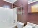 This bathroom boasts a white tub, toilet, and vanity for convenience at 133 Dailey Mill Rd, Mcdonough, GA 30253