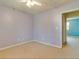 This bedroom is bathed in soft light streaming through the window, creating a cozy and inviting atmosphere at 133 Dailey Mill Rd, Mcdonough, GA 30253