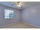 This bedroom is bathed in soft light streaming through the window, creating a cozy and inviting atmosphere at 133 Dailey Mill Rd, Mcdonough, GA 30253