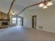 Spacious living area showcases a stone fireplace and ample natural light, ideal for gatherings at 133 Dailey Mill Rd, Mcdonough, GA 30253
