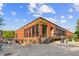 Historic brick building with large windows, showcasing the ASW Whiskey Exchange with a charming urban setting at 1518 Langston Sw Ave, Atlanta, GA 30310