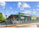 Commercial exterior showcasing an outdoor seating area and modern architecture with clear signage at 1518 Langston Sw Ave, Atlanta, GA 30310