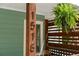 Close-up of the house number and a decorative fern on the front porch, adding character and curb appeal at 1518 Langston Sw Ave, Atlanta, GA 30310
