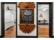 Chalkboard sign welcomes guests into a home with stylish interiors at 1518 Langston Sw Ave, Atlanta, GA 30310