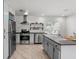 Bright kitchen featuring stainless steel appliances, and eat-in area at 1518 Langston Sw Ave, Atlanta, GA 30310