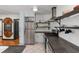 Stylish kitchen with stainless appliances, open shelving, and modern accents at 1518 Langston Sw Ave, Atlanta, GA 30310