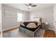 Cozy bedroom with soft rug, wooden floors, and a window with lots of light at 160 Brookhollow Trce, Alpharetta, GA 30022
