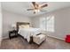 Charming bedroom with ceiling fan, carpet flooring, and a comfy window seat at 160 Brookhollow Trce, Alpharetta, GA 30022