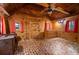 Bedroom with brick flooring, wood walls and cabinets, and rustic features at 3401 Clay Rd, Austell, GA 30106